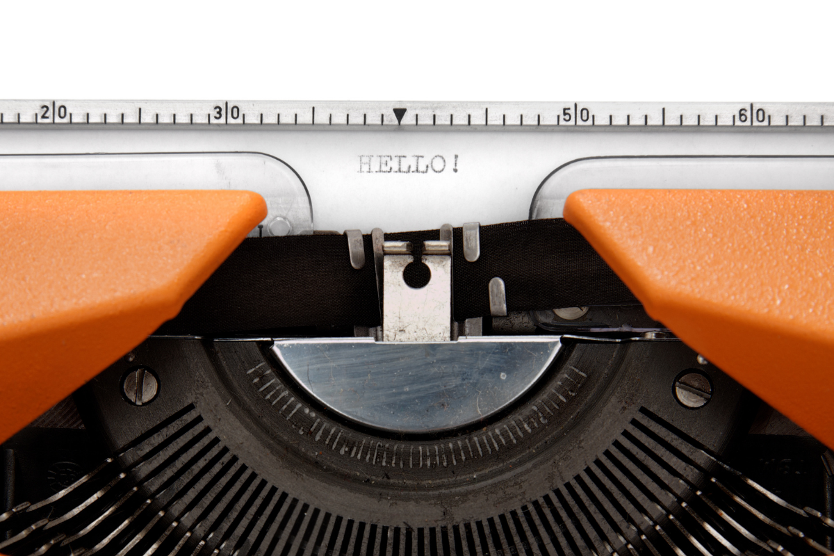 typewriter with hello typed